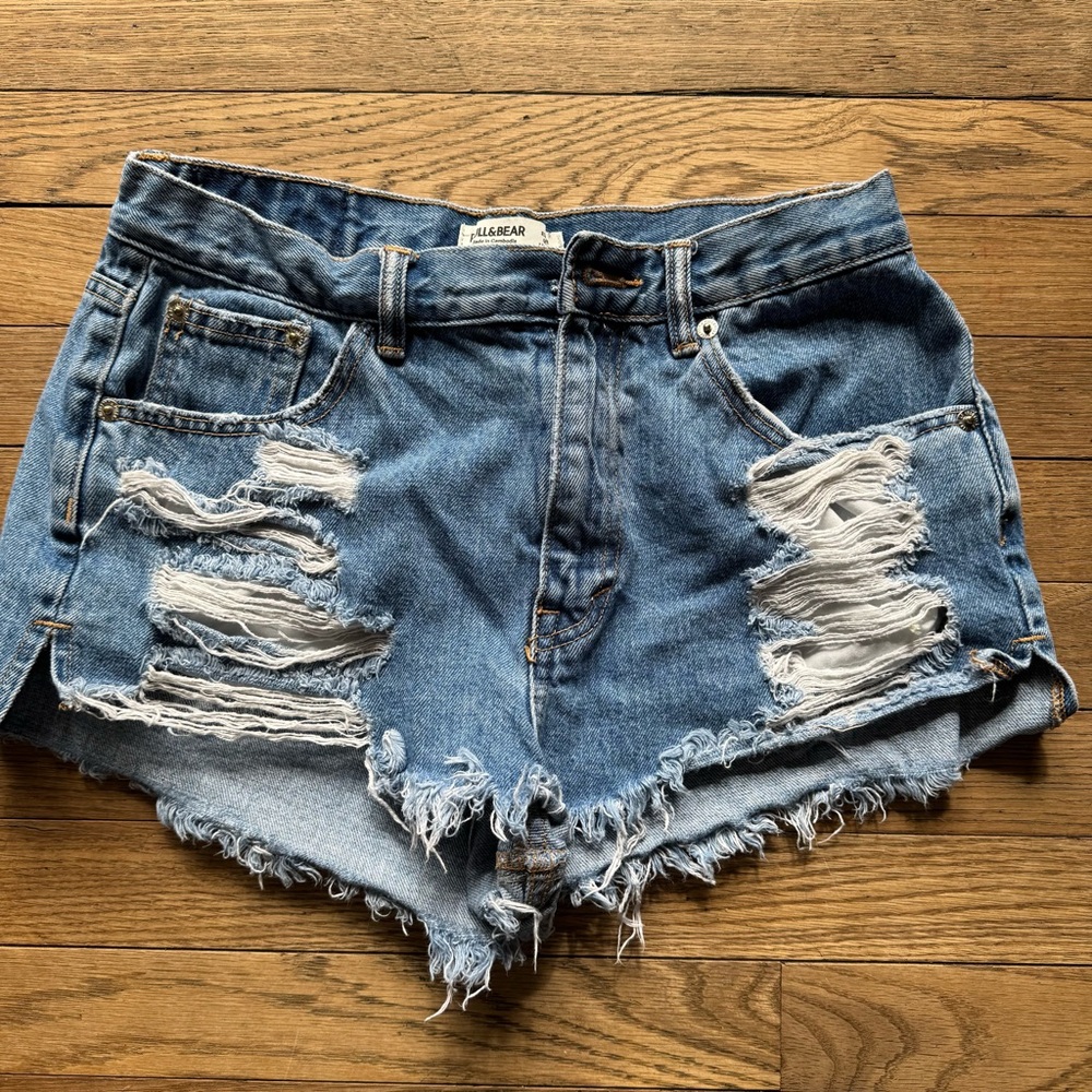 Pull and Bear Blue denim shorts with ripped details size 6 missing buckle